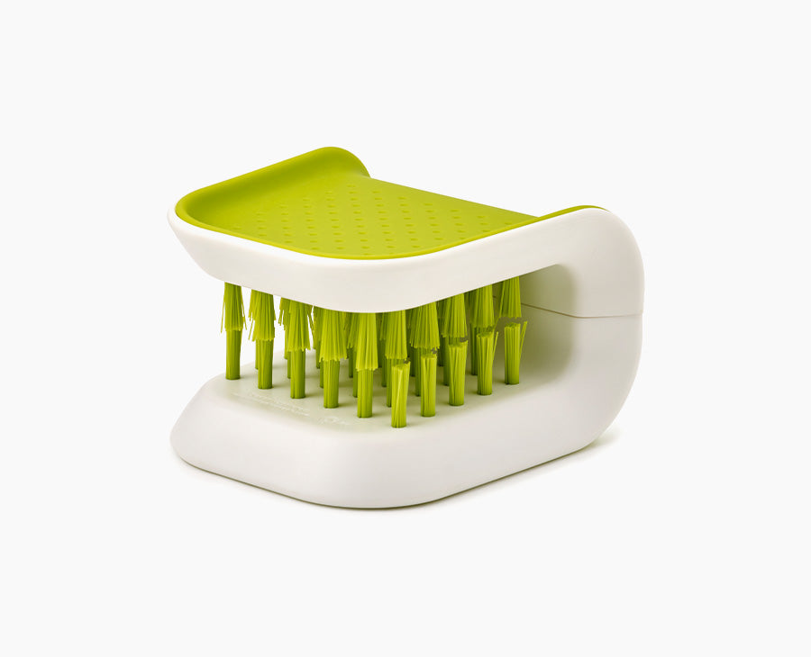 Green Joseph Joseph BladeBrush with opposing bristles